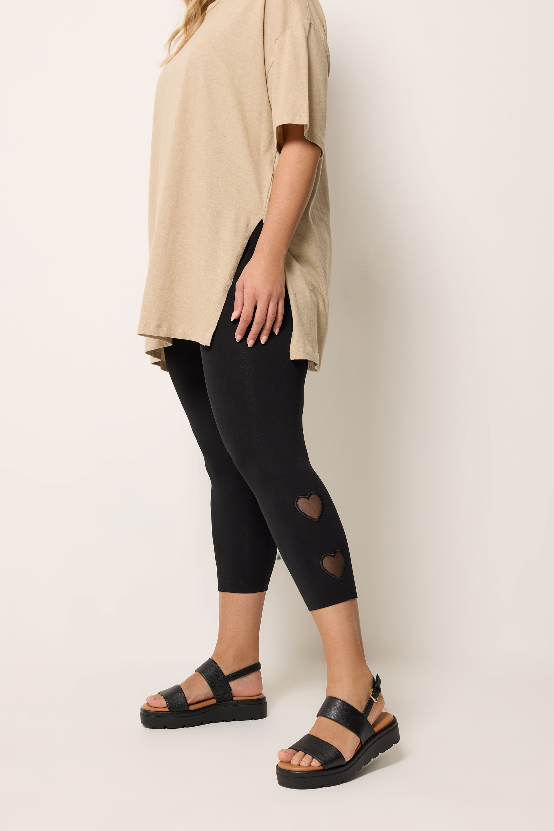YOURS Plus Size Black Heart Mesh Detail Cropped Leggings | Yours Clothing 1