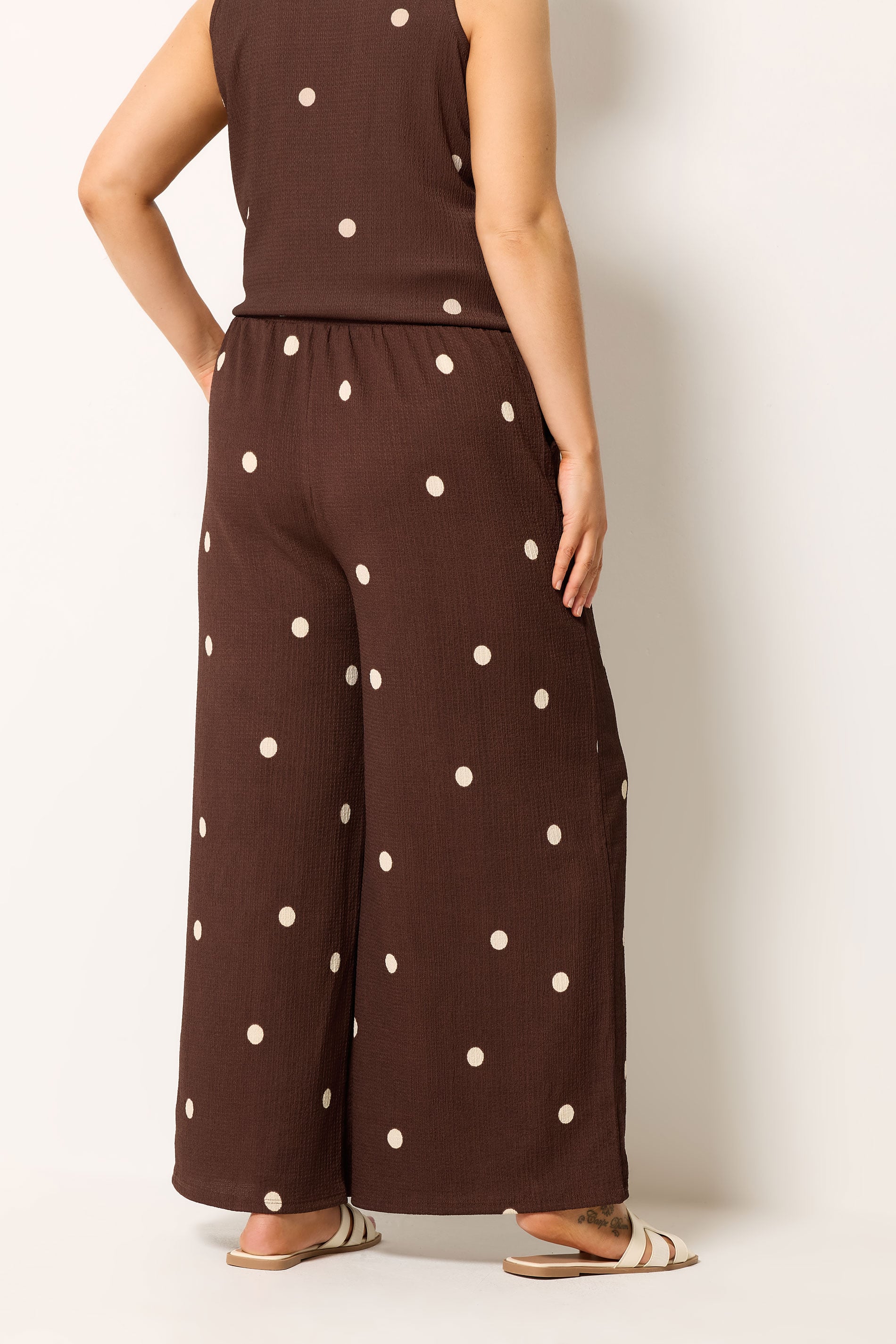 YOURS Plus Size Chocolate Brown Polka Dot Crinkle Trousers | Yours Clothing 2
