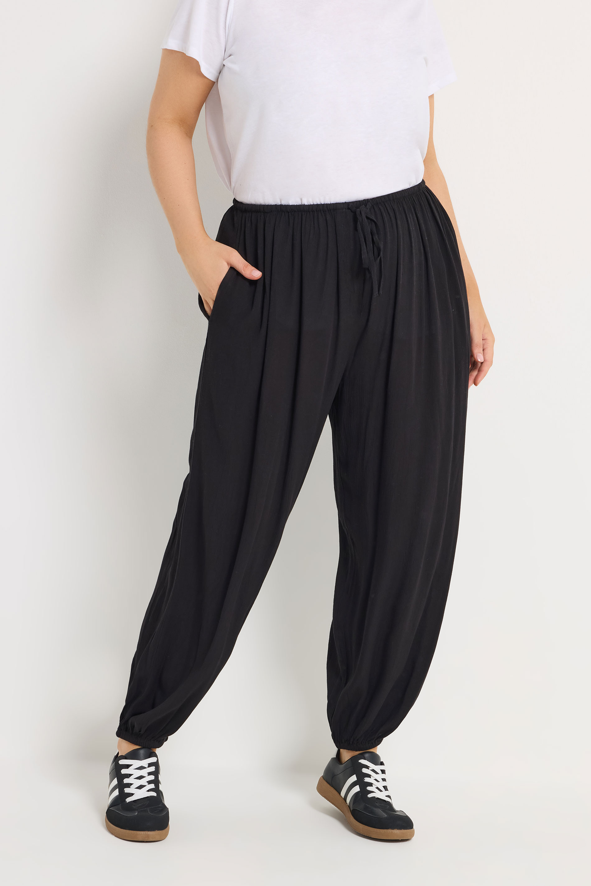 YOURS Plus Size Black Cuffed Balloon Trousers | Yours Clothing 1
