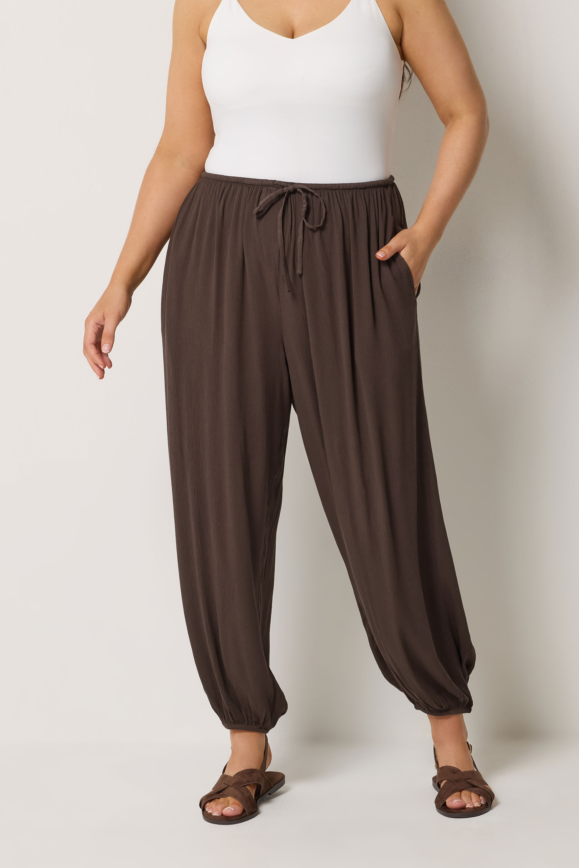 YOURS Plus Size Chocolate Brown Cuffed Balloon Trousers | Yours Clothing 1
